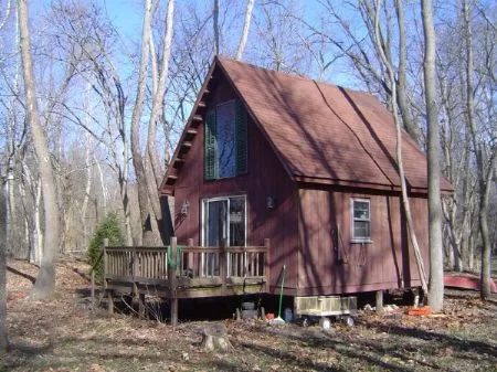 42 Acres 2 Cabins and House Creek property photo 1