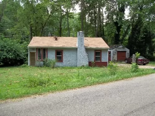 Huge Cave with Cottage